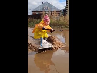 a 3-year-old resident of nizhnekamsk named zara rode a wakeboard through the puddles of her city.